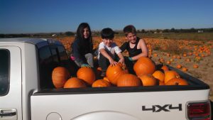 Grandkids and Gleaned Pumpkins